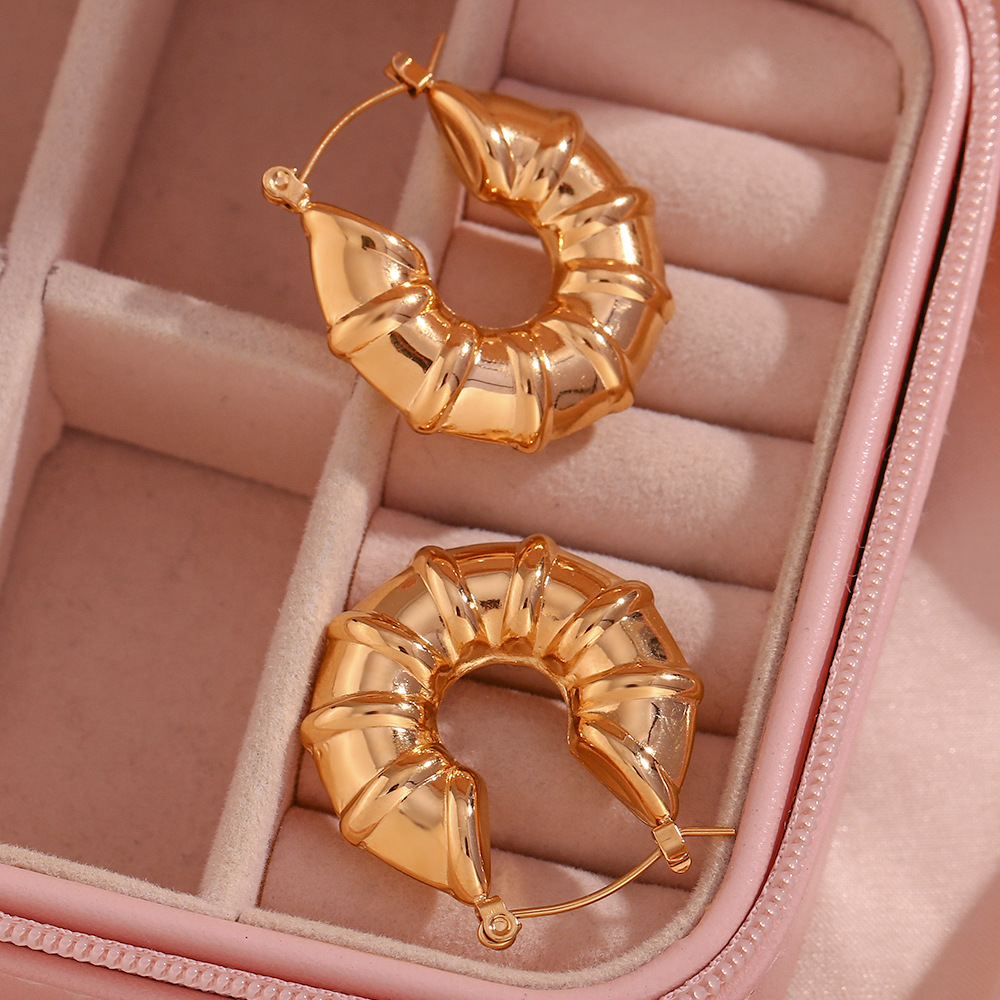 LICA JEWELRY European and American fashion simple personality earrings accessories stainless steel plated 18K gold three-dimensional tire hollow shape