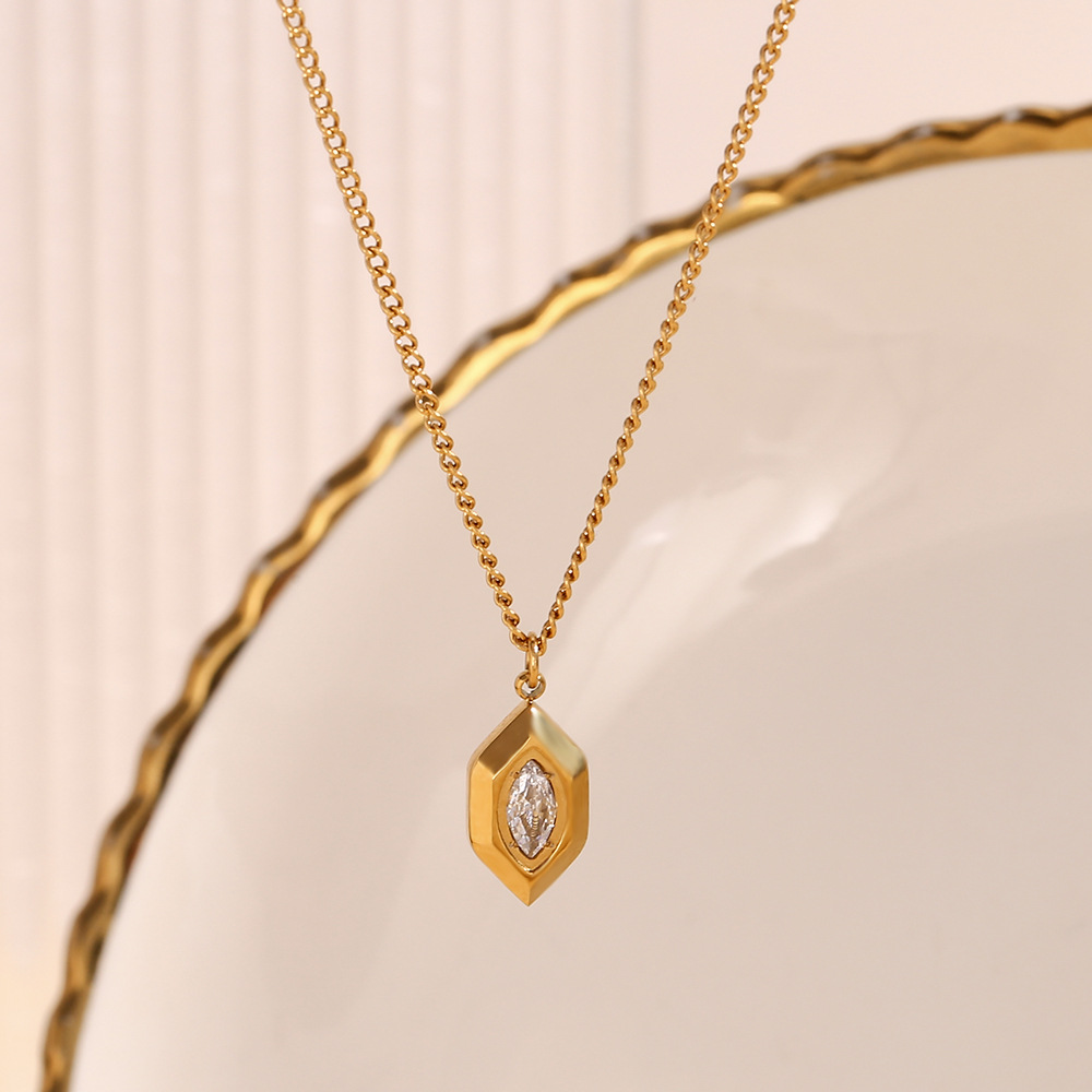 Personalized pendant necklace made of stainless steel plated with 18K gold, featuring a rhombus-shaped marquise white diamond. Women's style.